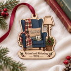Retirement cozy armchair wooden ornament with red ribbon lying on white knit