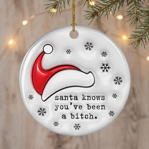 Sassy Christmas ornament hanging against light wood