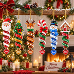 Six spiral ornament designs including a gingerbread house hanging from a mantel