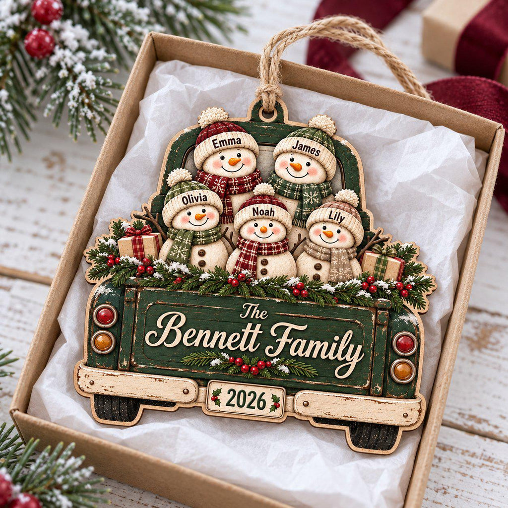 Personalized snowman family truck wooden ornament in a kraft gift box with tissue paper