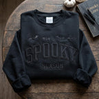 Black Spooky Season embroidered sweatshirt styled with fall decor