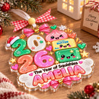 Year of Squishies ornament lying on a wooden table