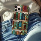 Stained glass book lover phone case on an iPhone resting on blue jeans