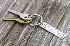 Personalized state and initials keychain holding house keys