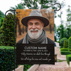 Today Tomorrow Always portrait memorial garden flag with name and dates beside a stone garden path