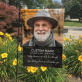 Today Tomorrow Always portrait memorial garden flag with name and dates in a garden bed with yellow lilies