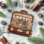 Travel suitcase ornament flat lay with pine cones and cinnamon