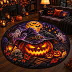 Witch hat jack-o'-lantern round quilted rug in a dark living room with a leather sofa and candles