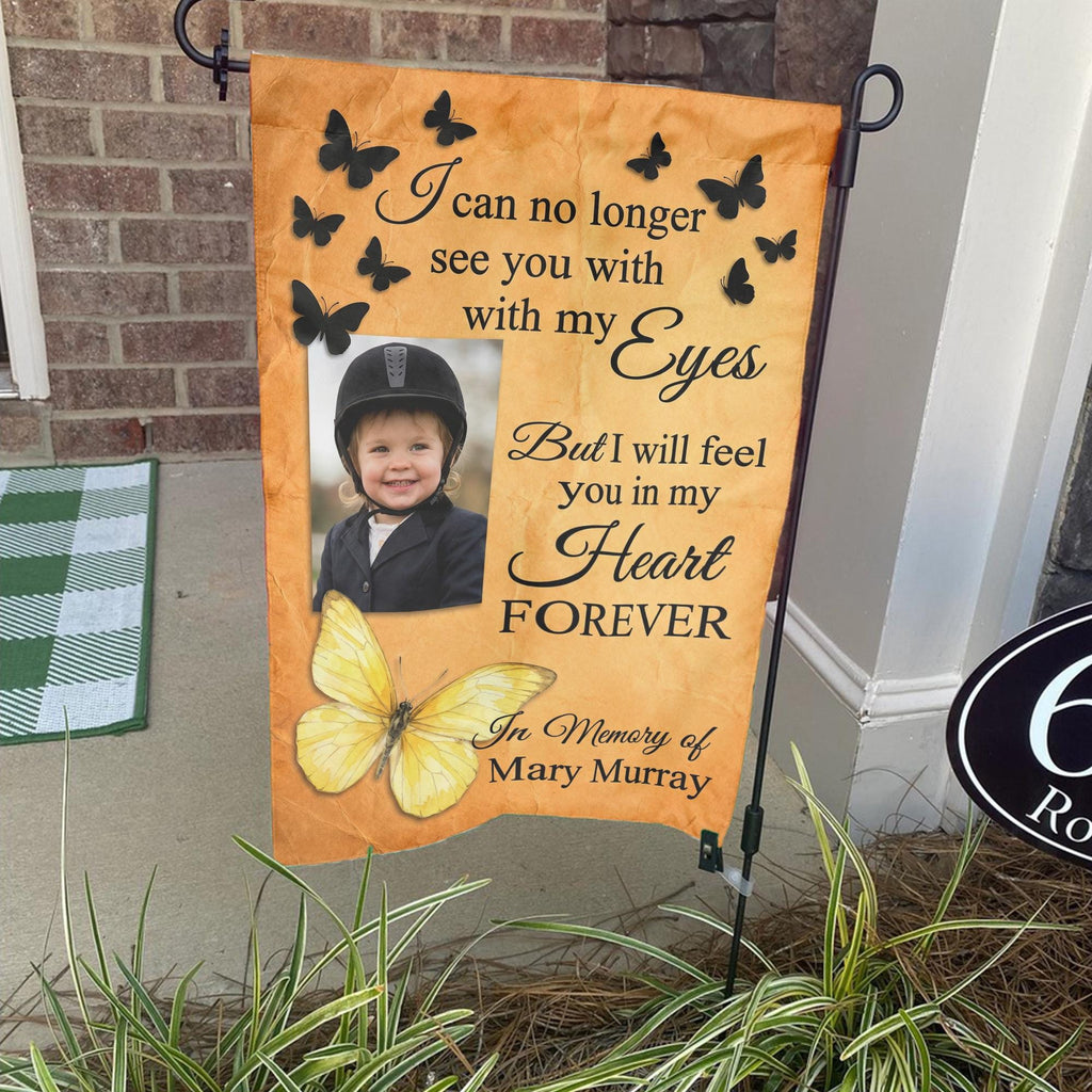 Yellow butterfly I Will Feel You In My Heart photo memorial garden flag on a stand by a brick front porch