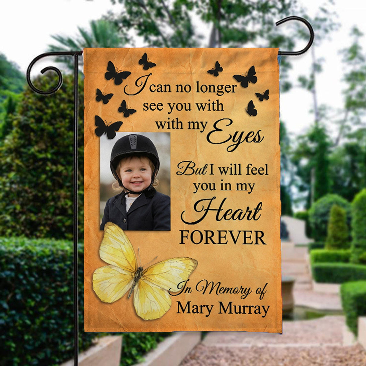 Yellow butterfly I Will Feel You In My Heart photo memorial garden flag beside a stone garden path